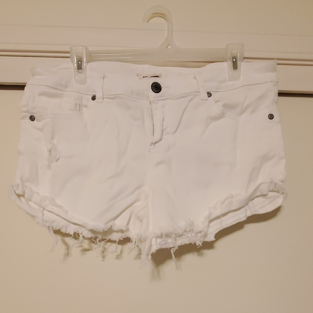 White distressed jean shorts
